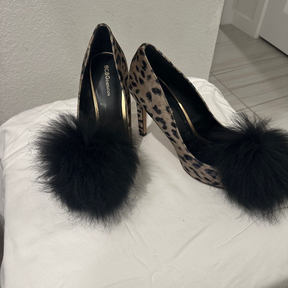 Black and Beige leopard print pumps with beautiful faux mink Pom Pom front.